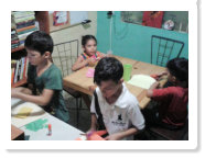 Students come to Ruben's house after school for tutoring.