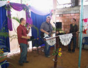 Barry Duell, Luke Thompson & Ruben help lead worship. 