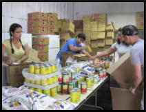 Packing assembly line. These volunteers came all the way from Venezuela! (2012)