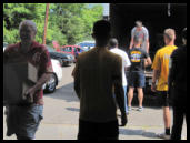 Volunteers help unload the MTM truck.