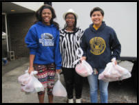 Shipmates & Hope Scholars return from taking food to clients' cars.